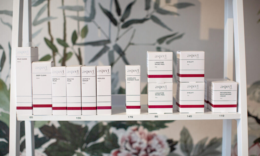 Aspect Dr skincare products on a shelf from cleansers, to serums, peels and moisturiser.
